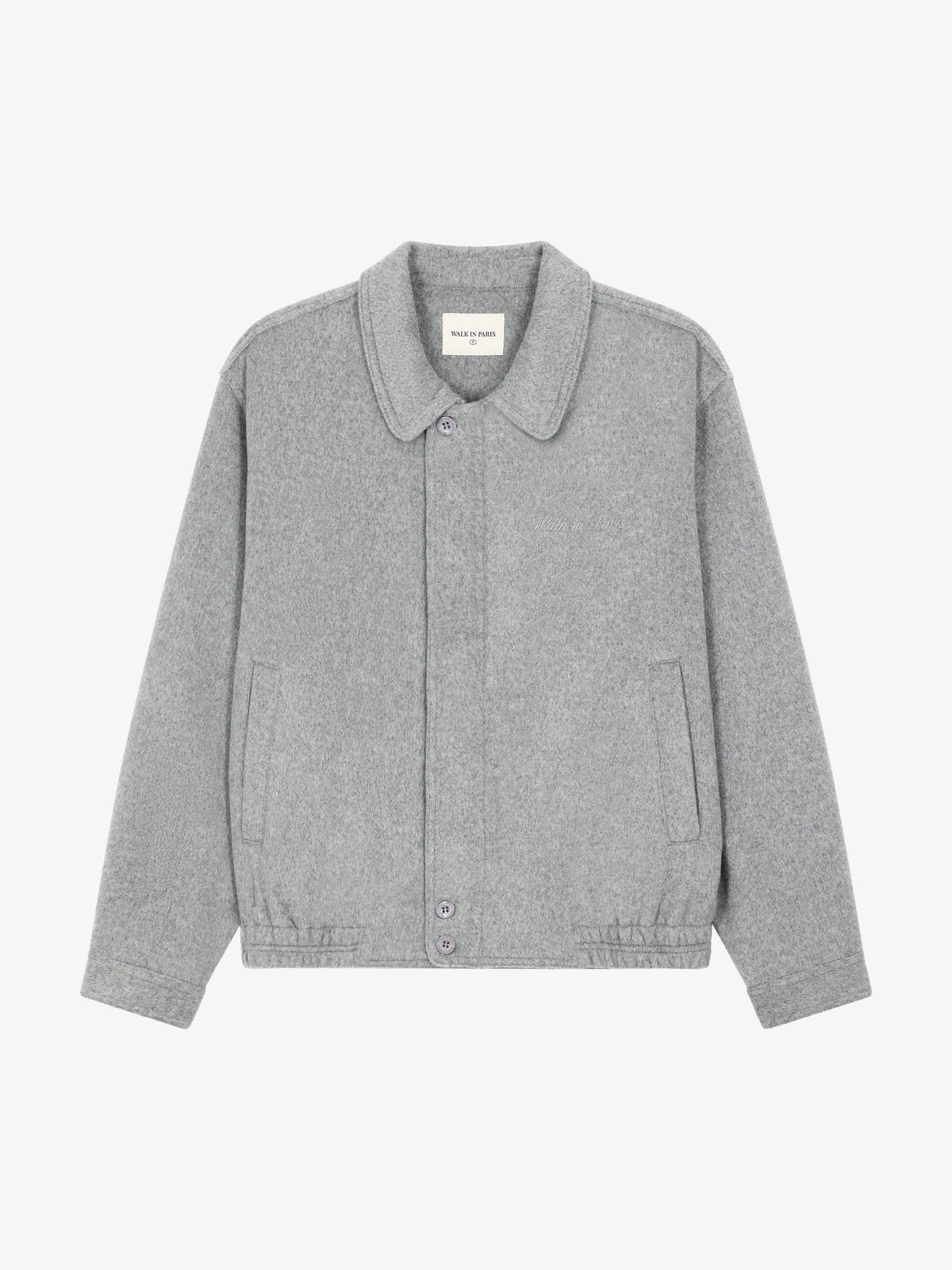 La veste en laine grise