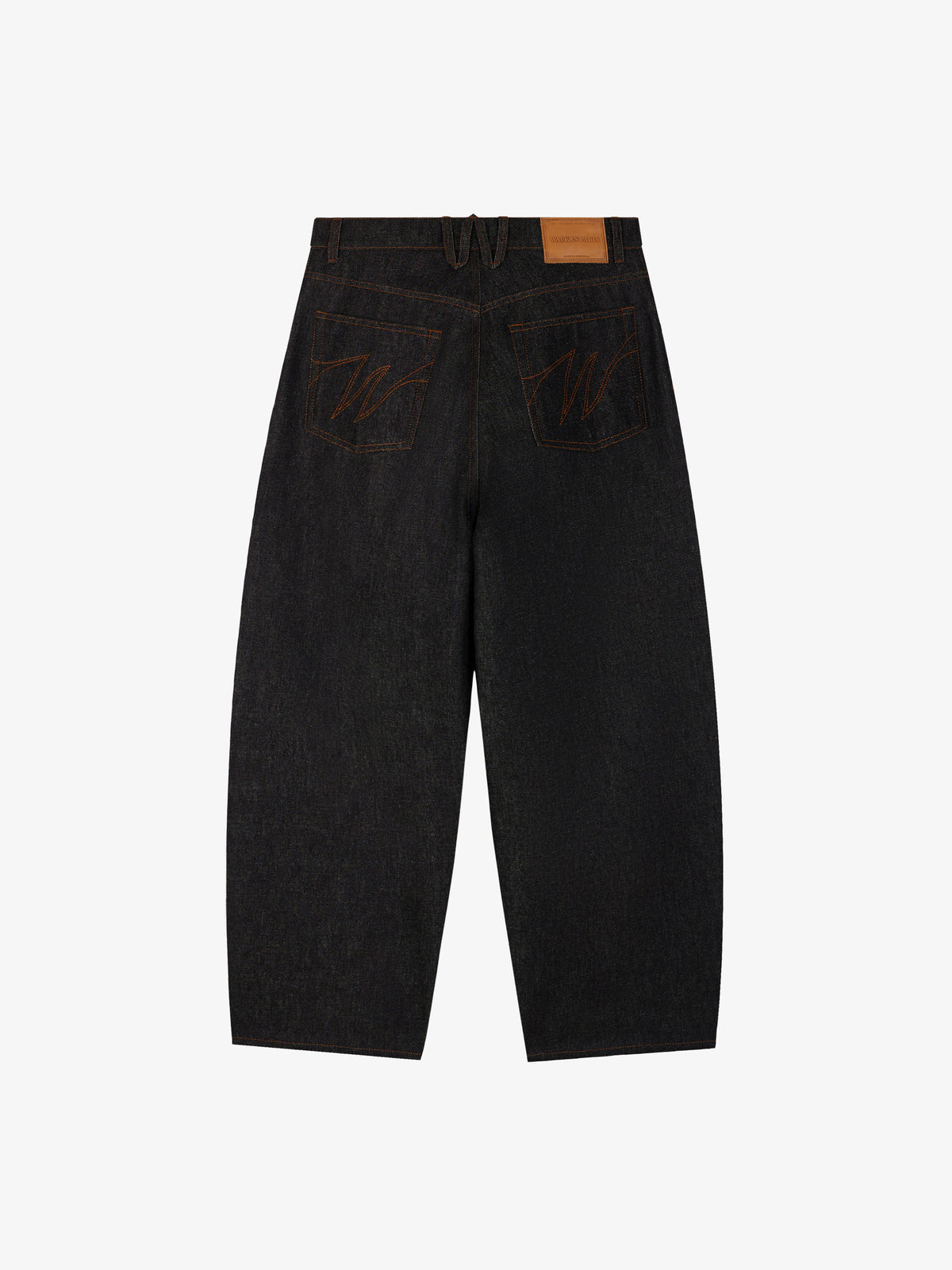 Le pantalon ballon en denim brut