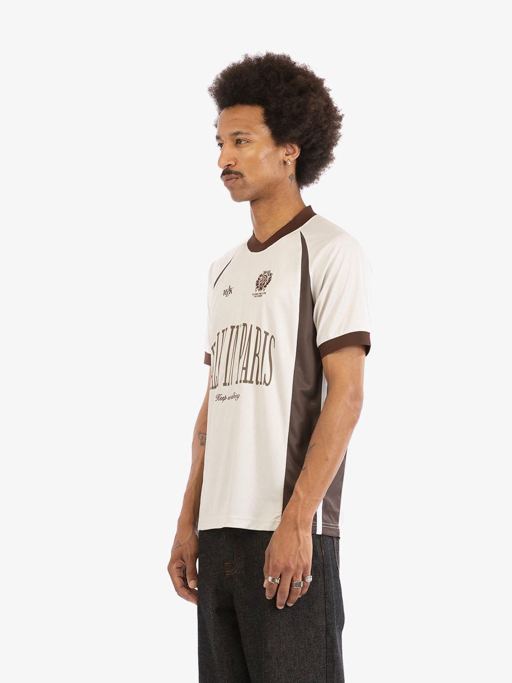 The beige football jersey