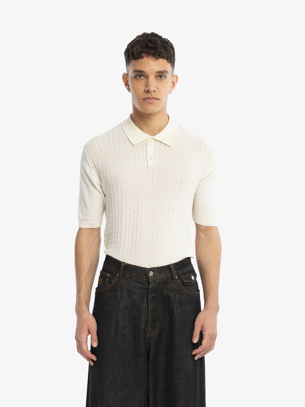 The beige cable knit polo shirt