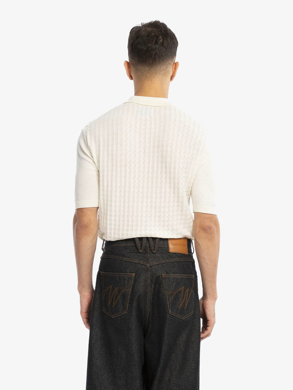 The beige cable knit polo shirt