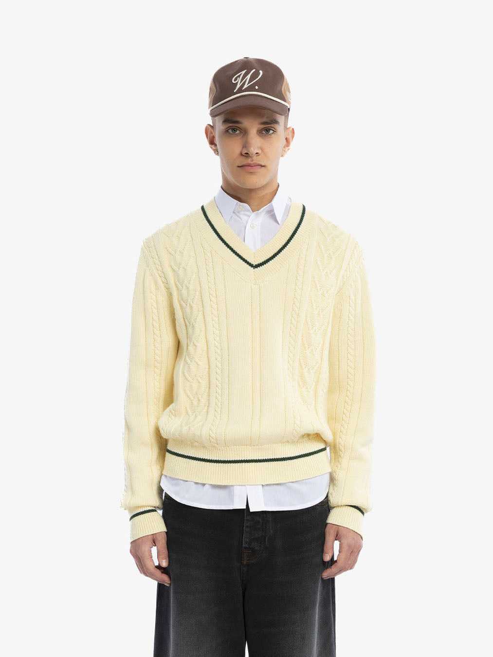 The beige knitted sweater