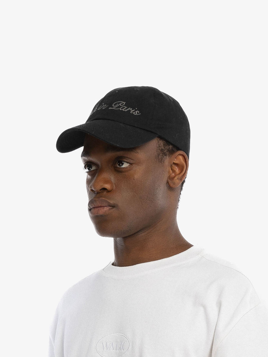 La casquette signature noire