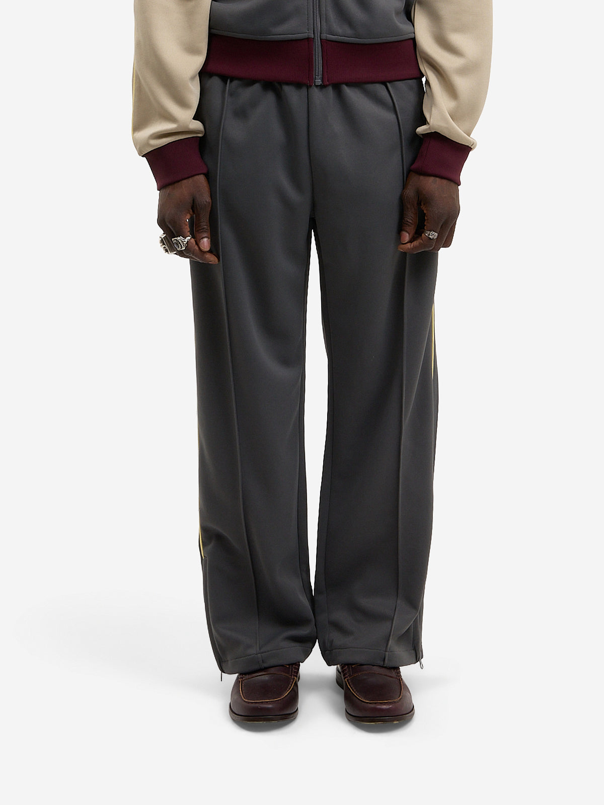 The grey and beige Signature jogging pants