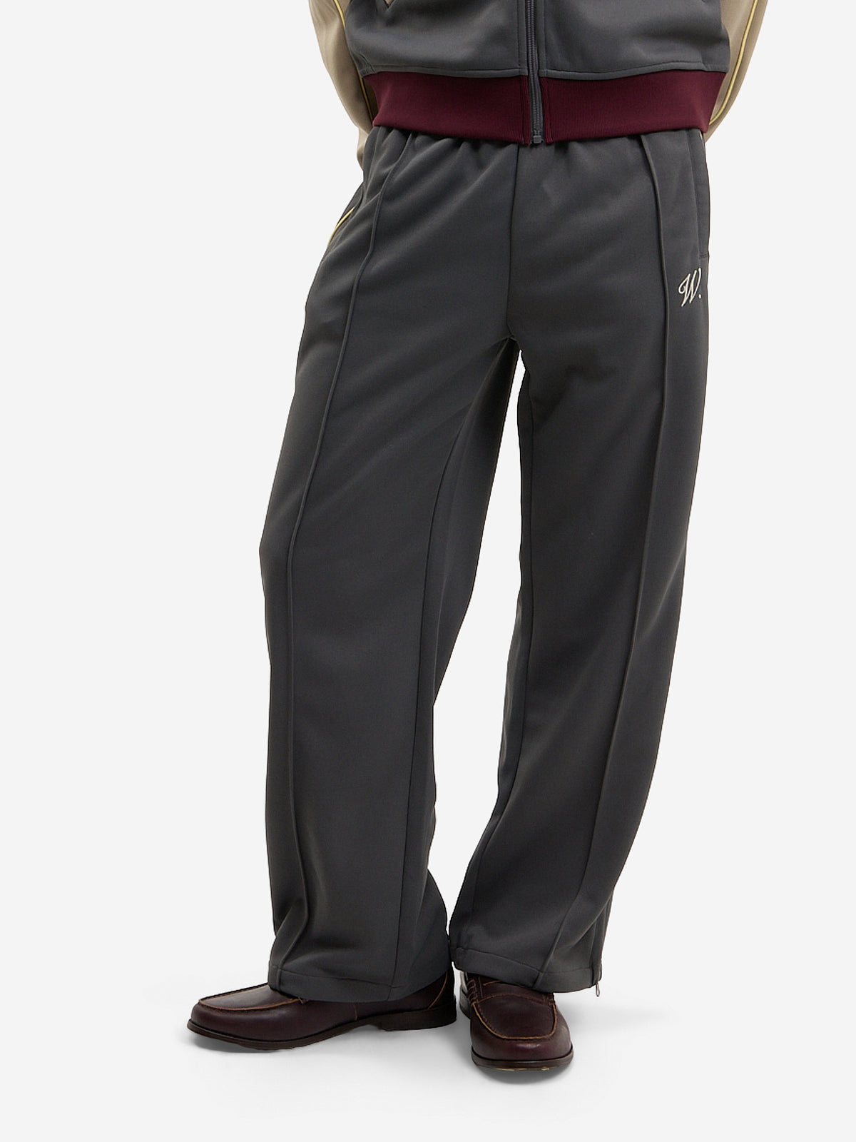 The grey and beige Signature jogging pants