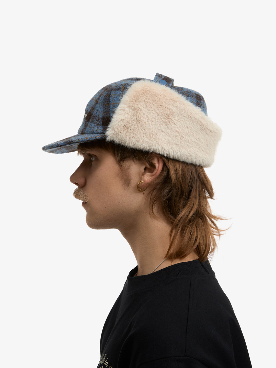 La casquette de Trappeur à carreaux bleue