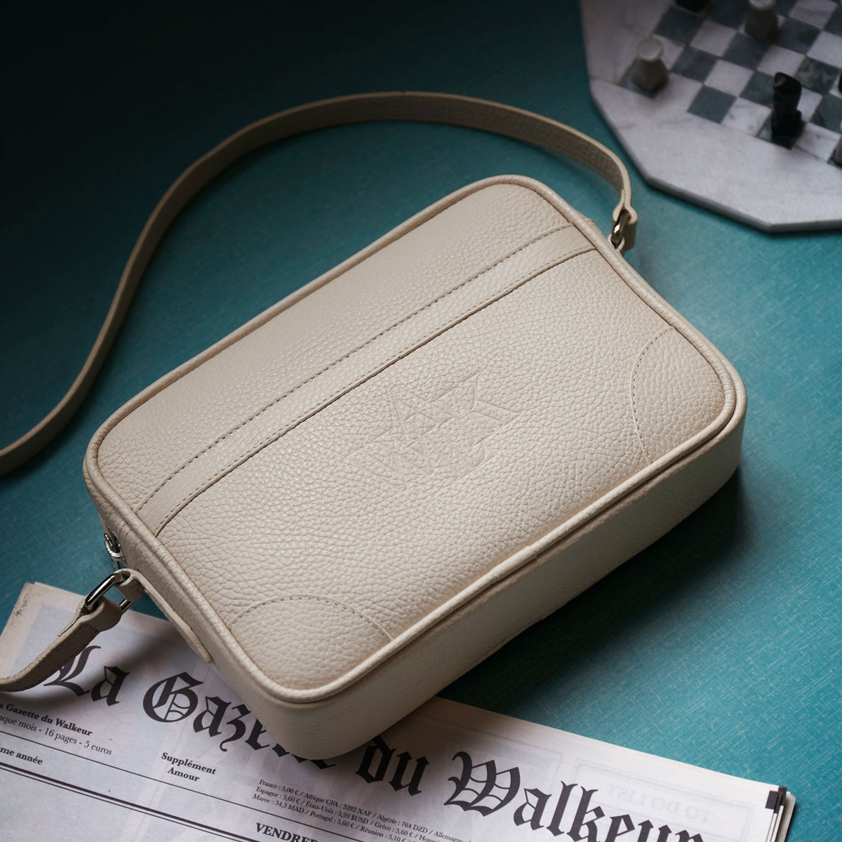 La sacoche en cuir beige