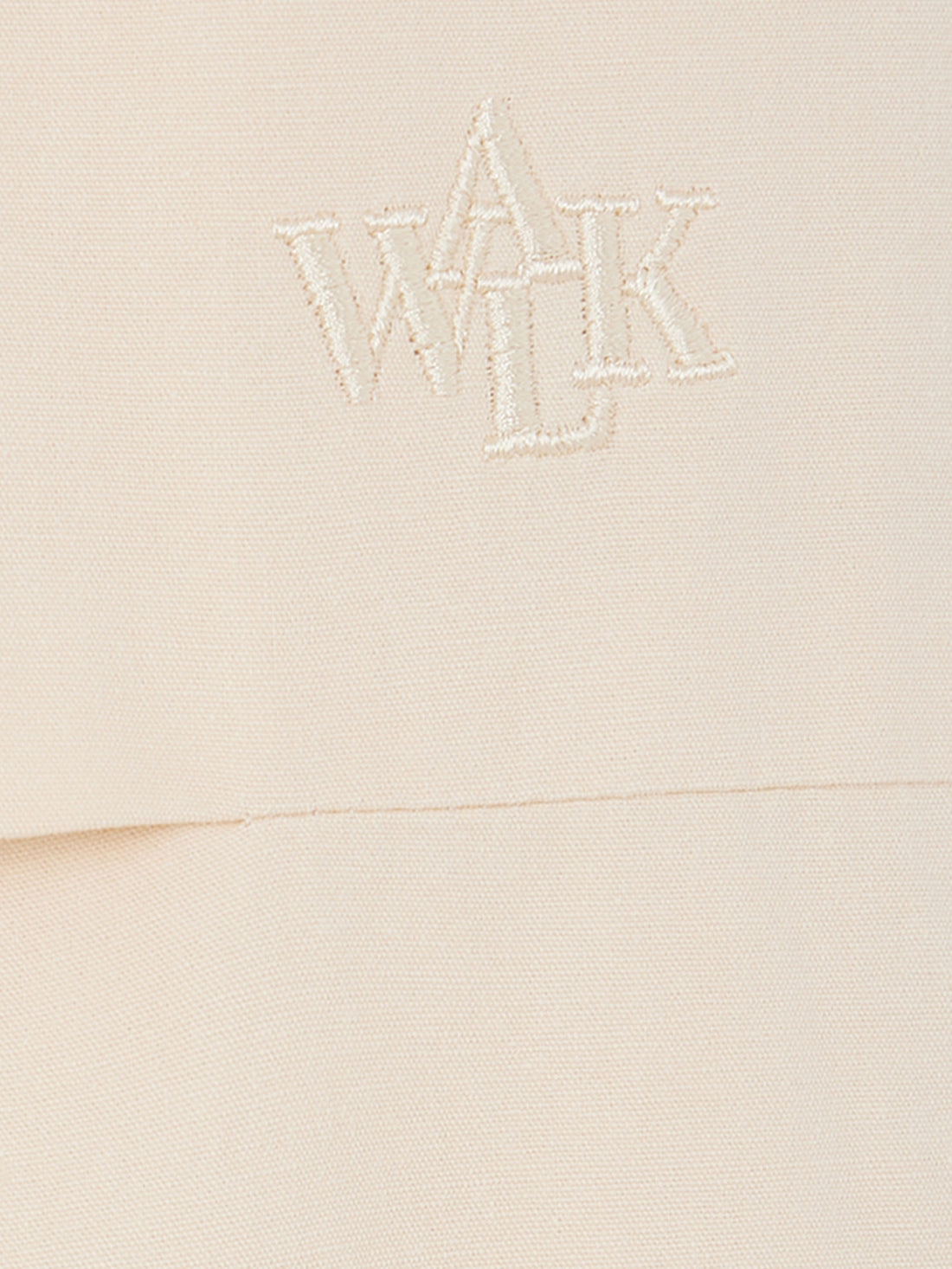 Le pantalon parachute sable