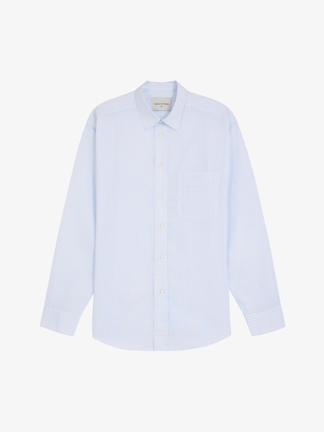 La chemise manches longues à carreaux