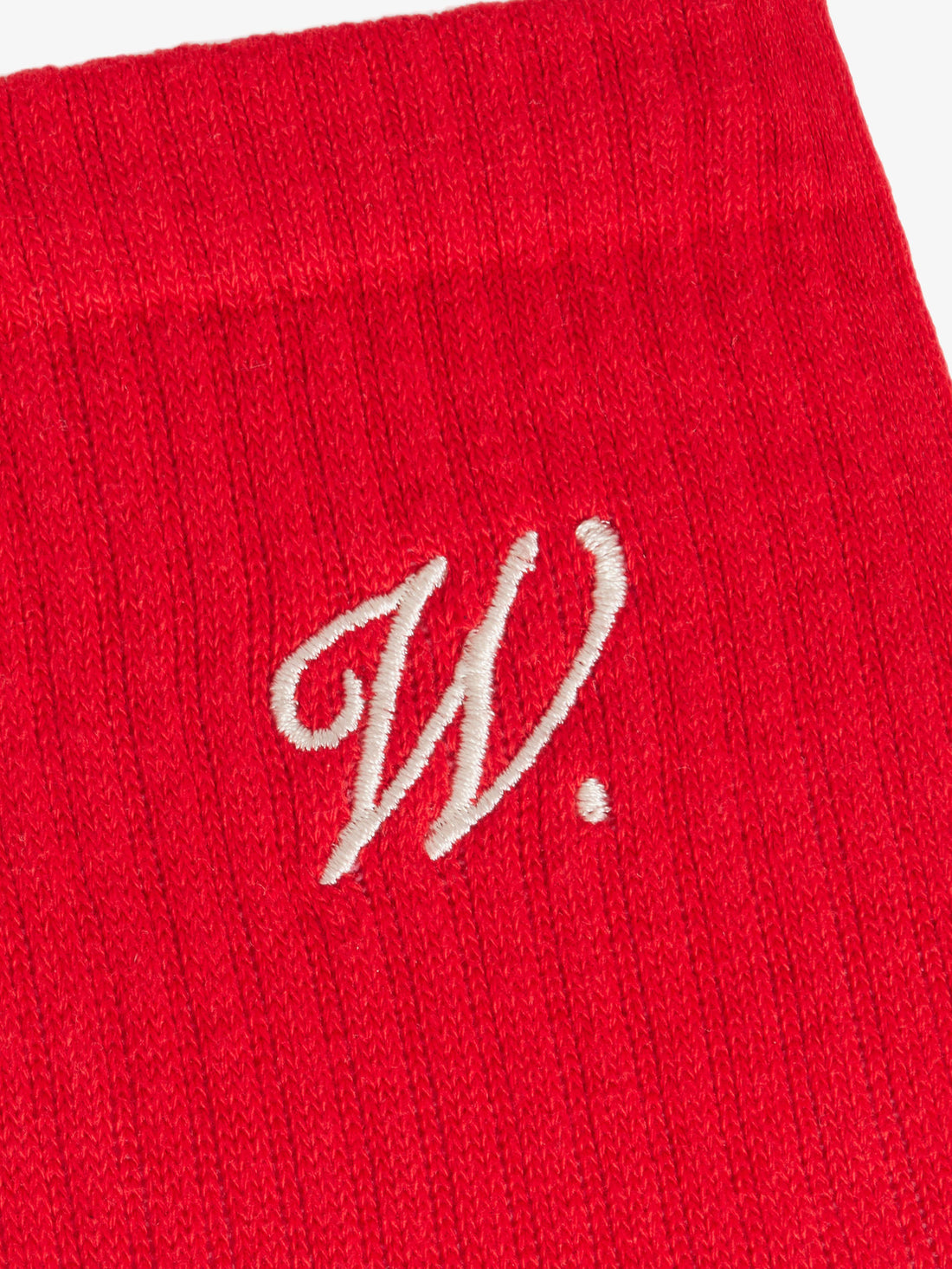 Les chaussettes signature rouges