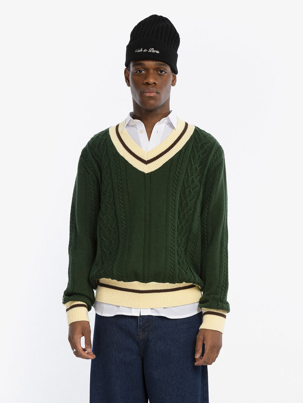 Le pull en maille vert
