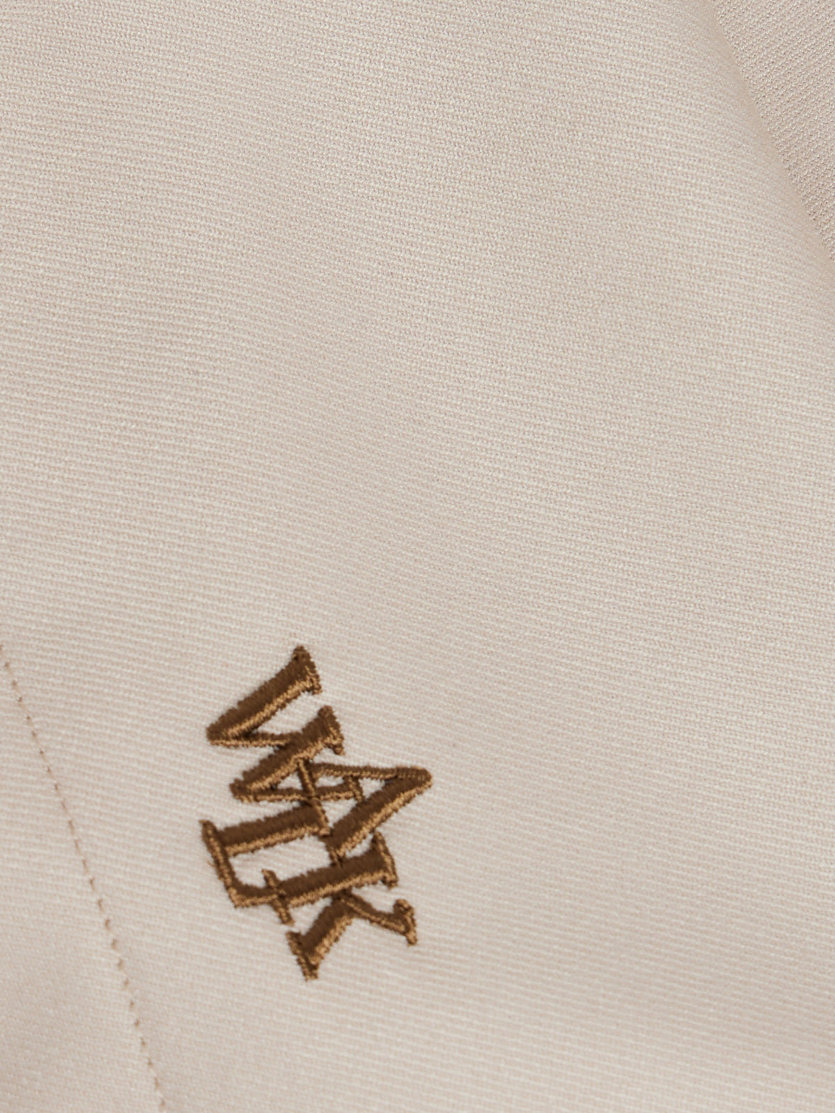 Le short de costume beige