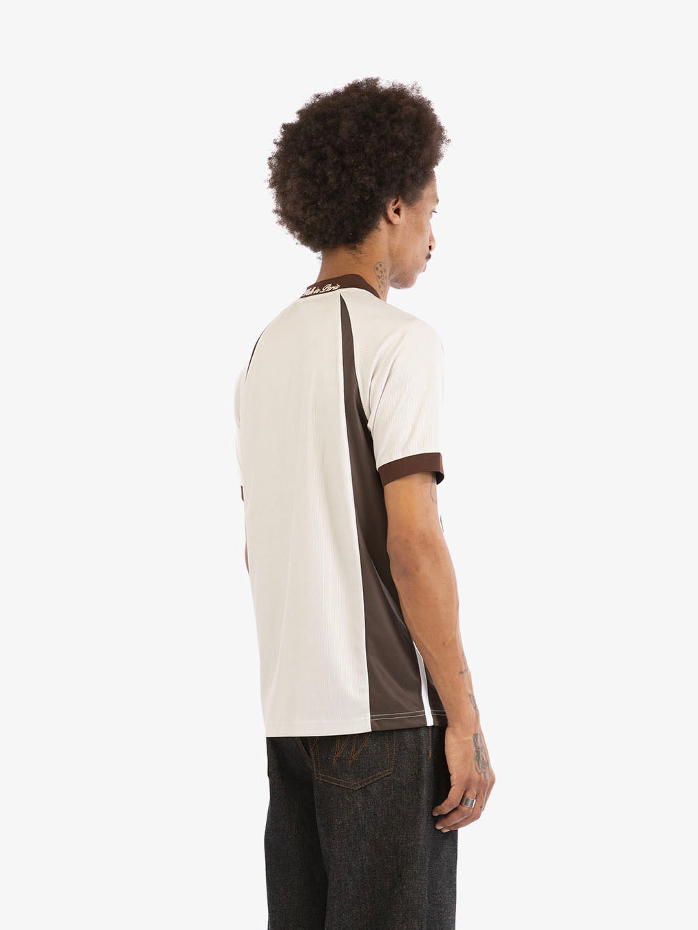 The beige football jersey