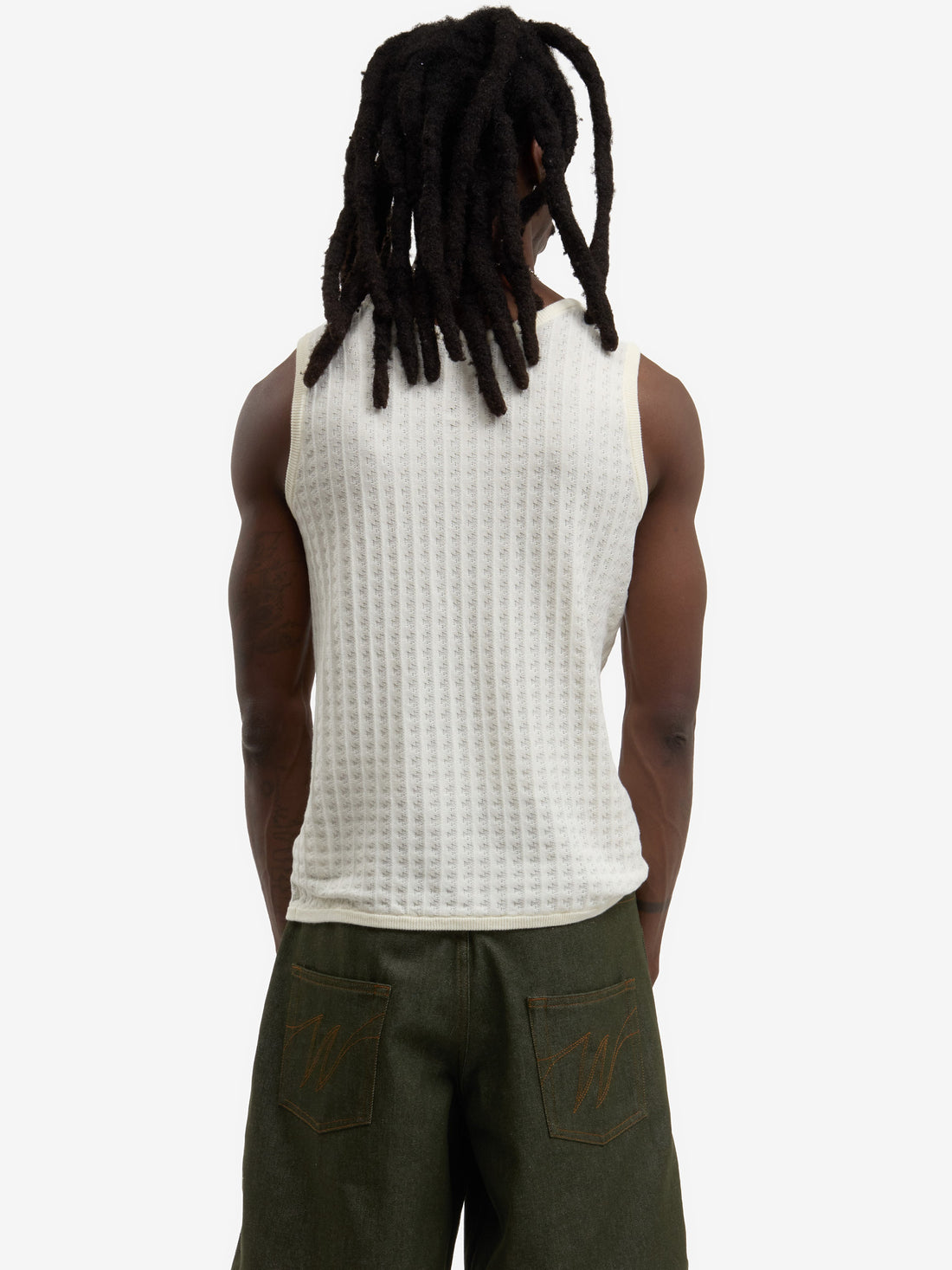 The beige knit tank top