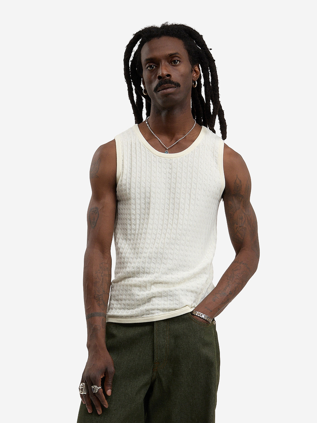 The beige knit tank top