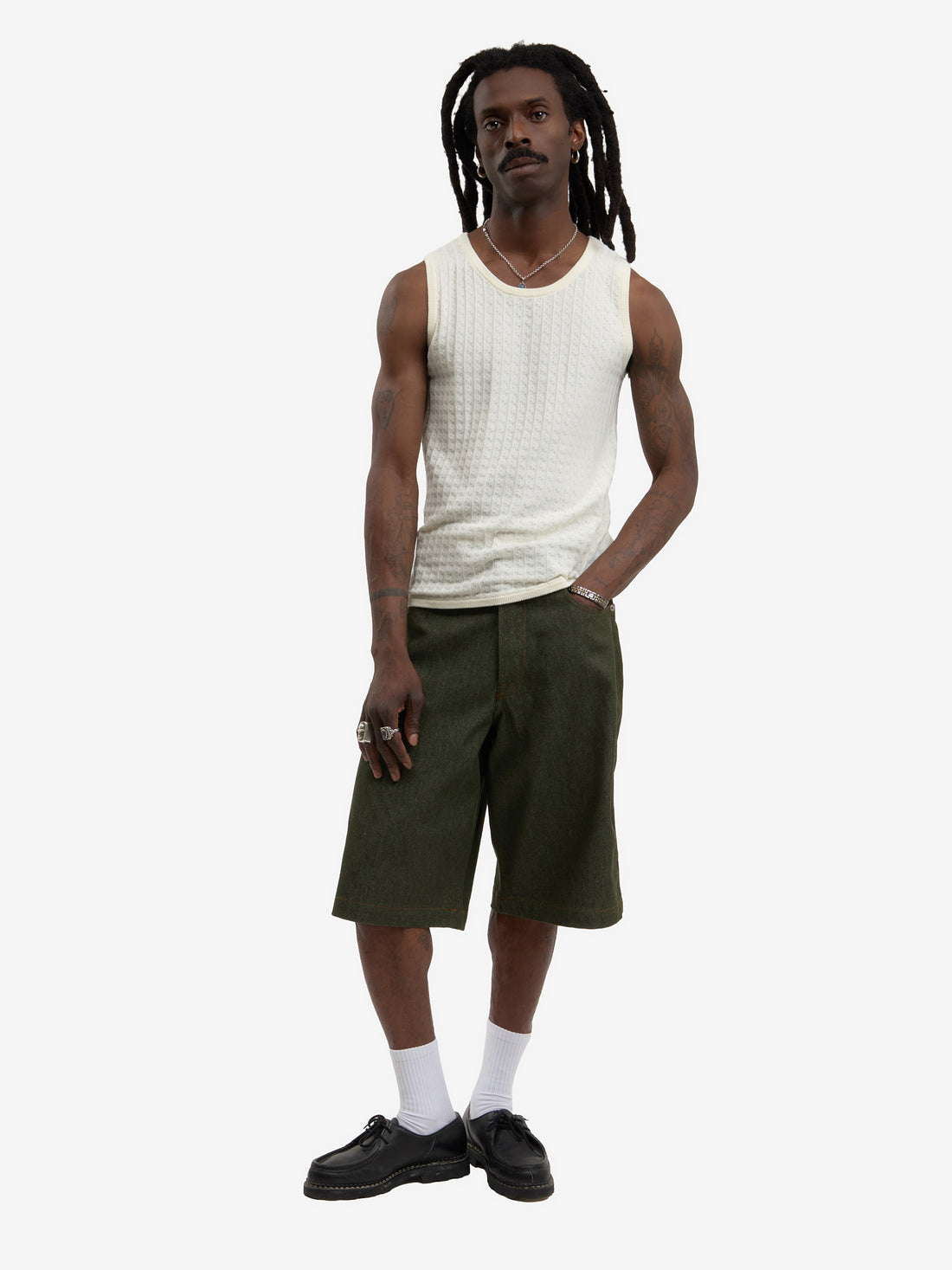 The beige knit tank top