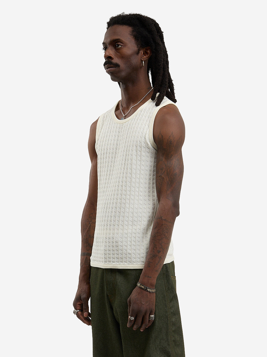 The beige knit tank top