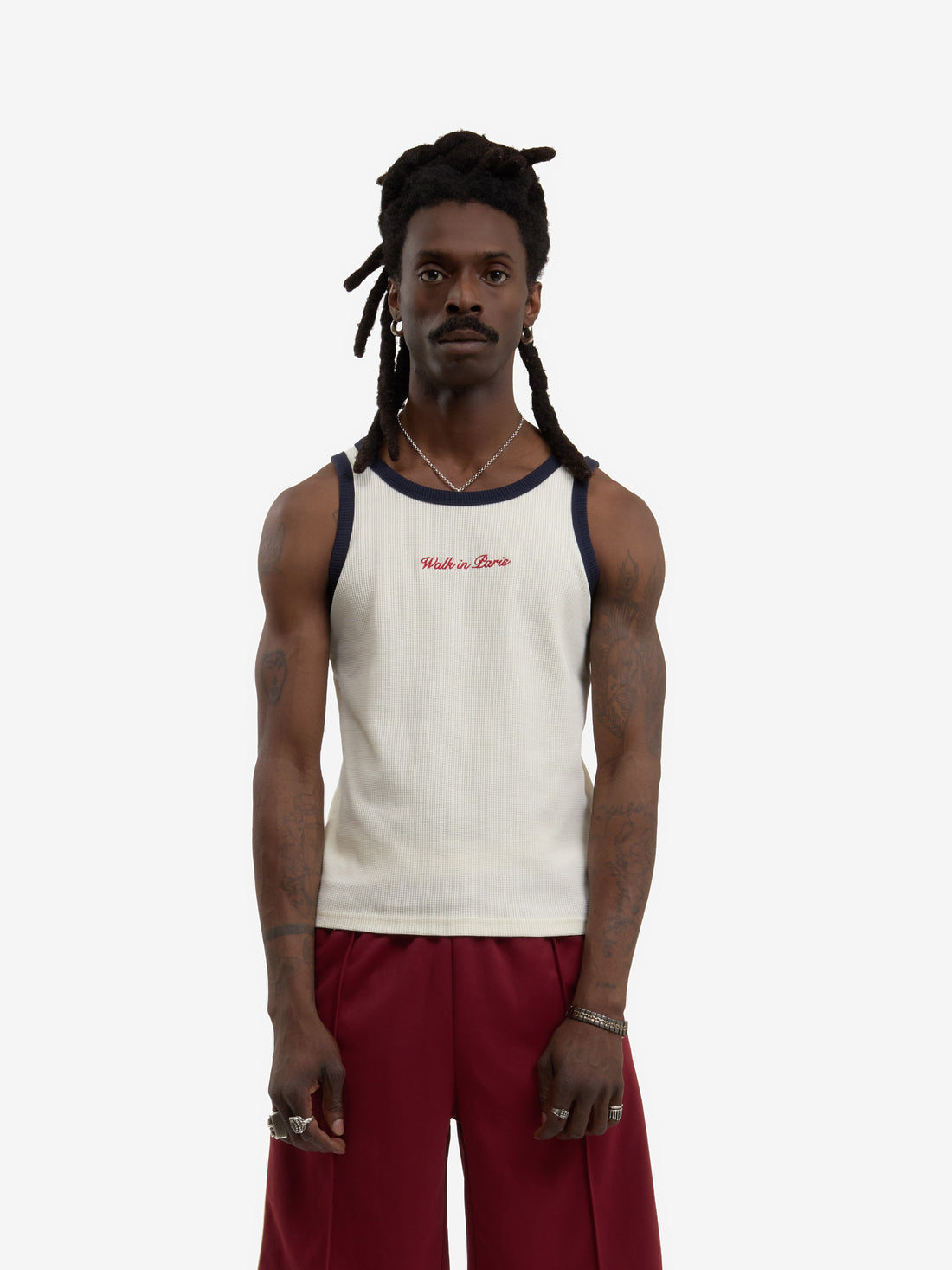 The beige waffle-patterned tank top 
