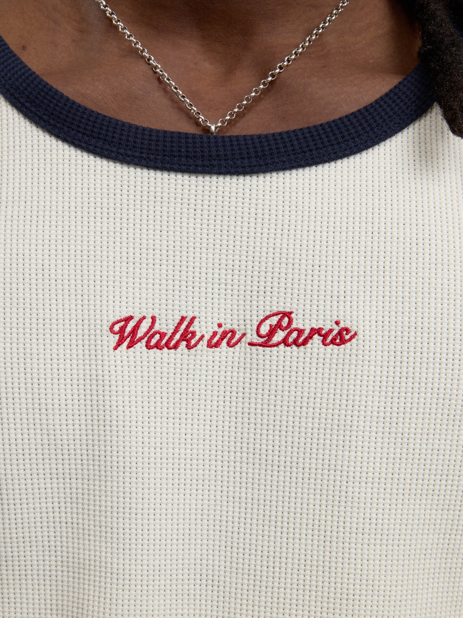 The beige waffle-patterned tank top  5