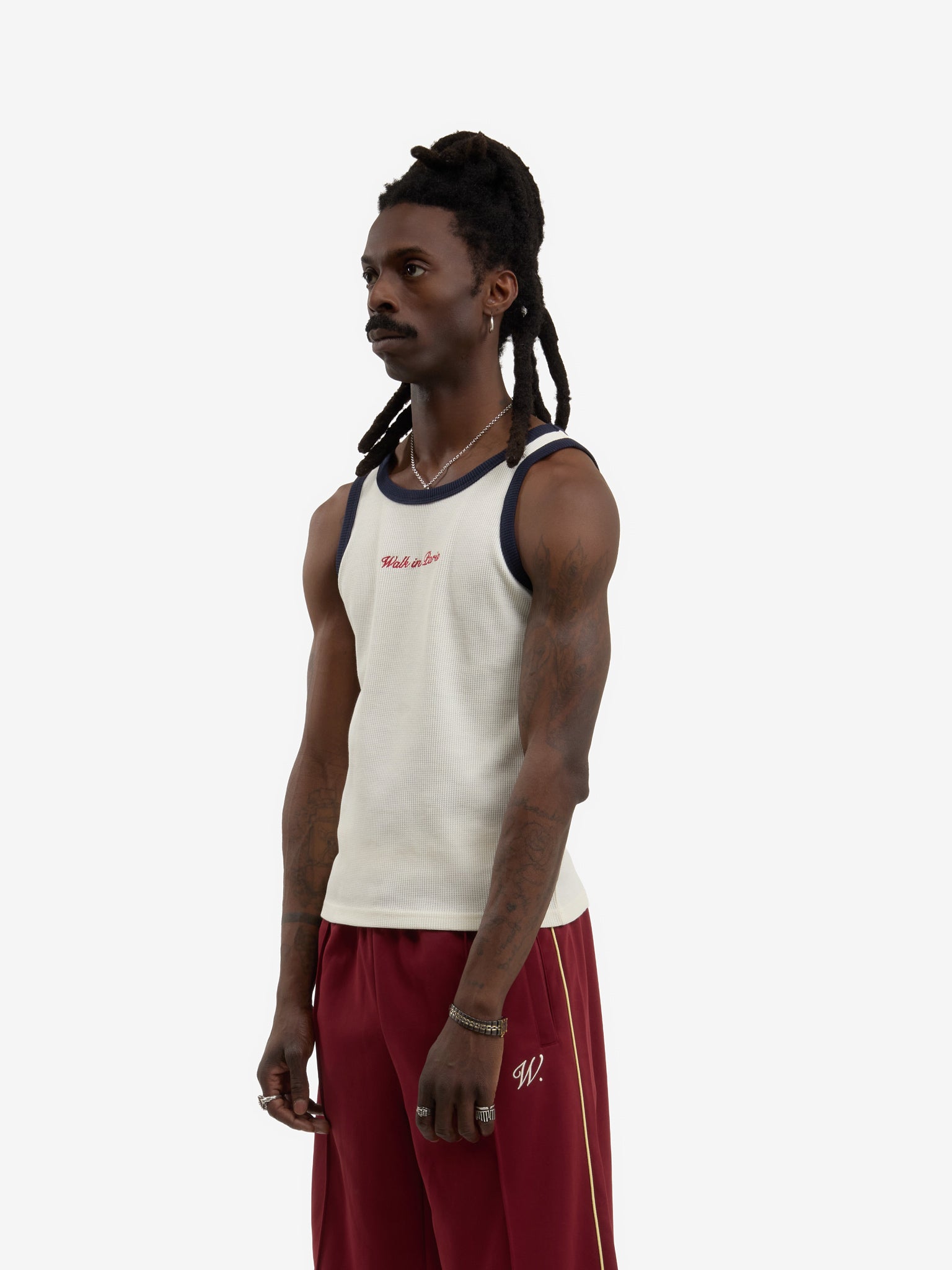 The beige waffle-patterned tank top  3