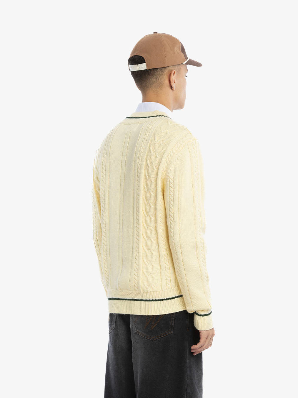The beige knitted sweater