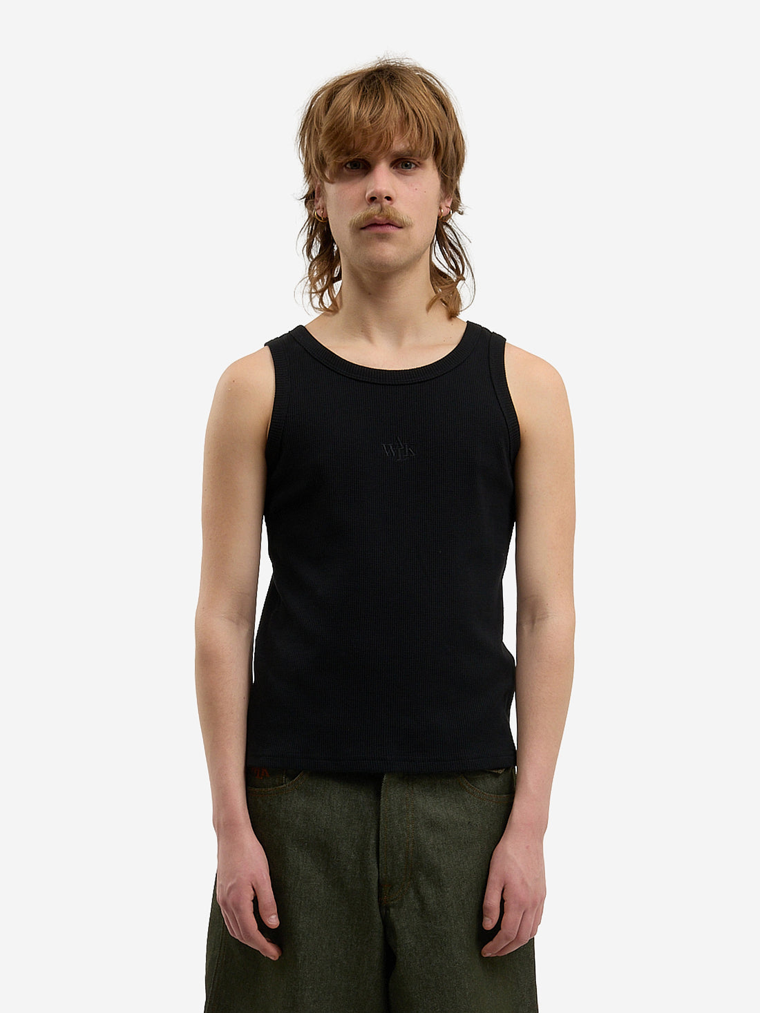 The black waffle-patterned tank top 