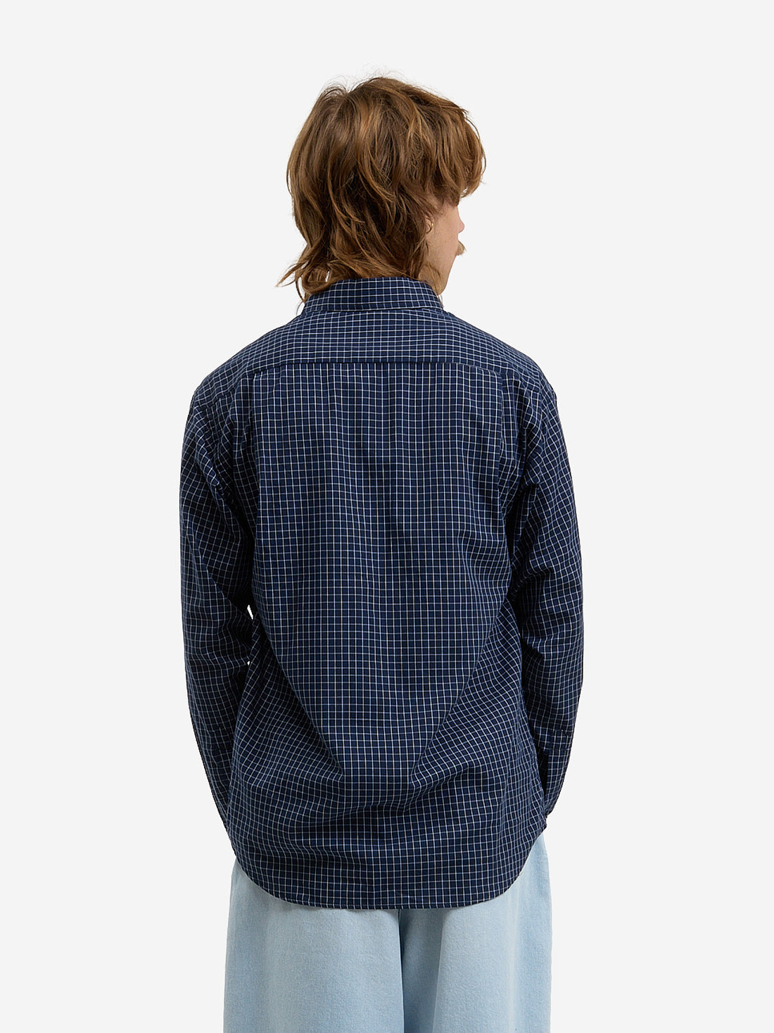 The blue plaid shirt