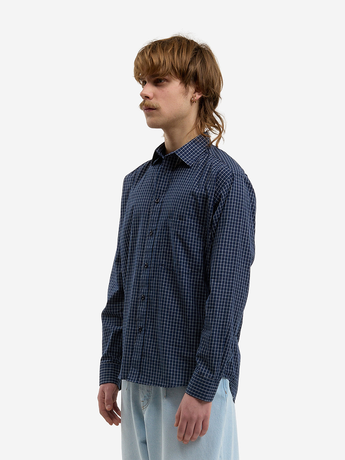 The blue plaid shirt