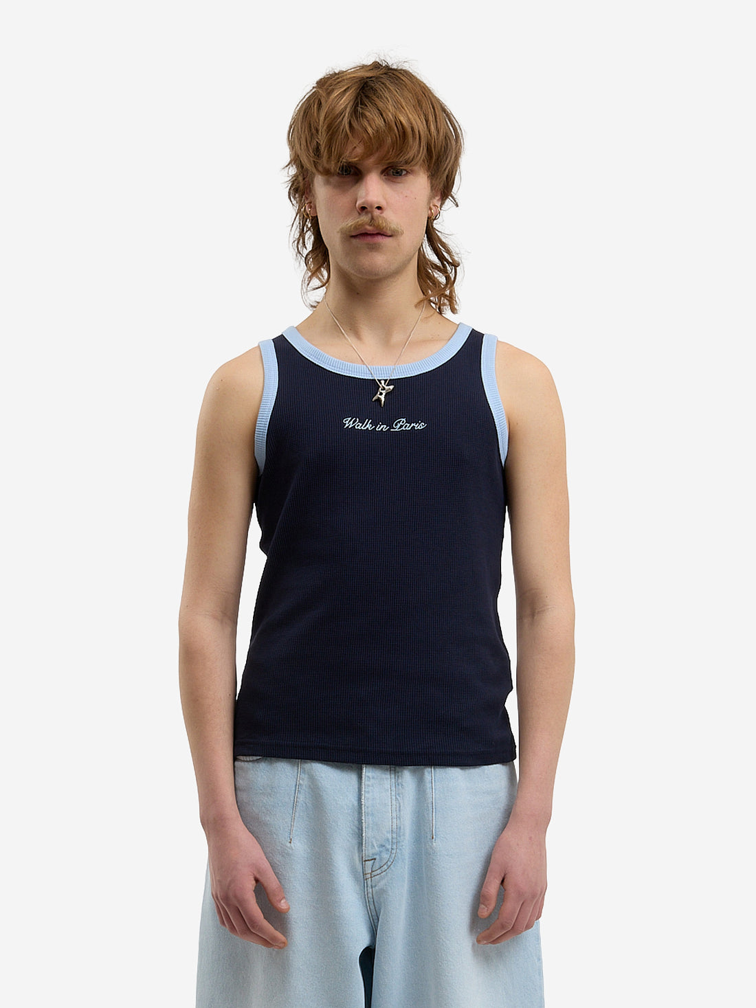 The blue waffle-patterned tank top