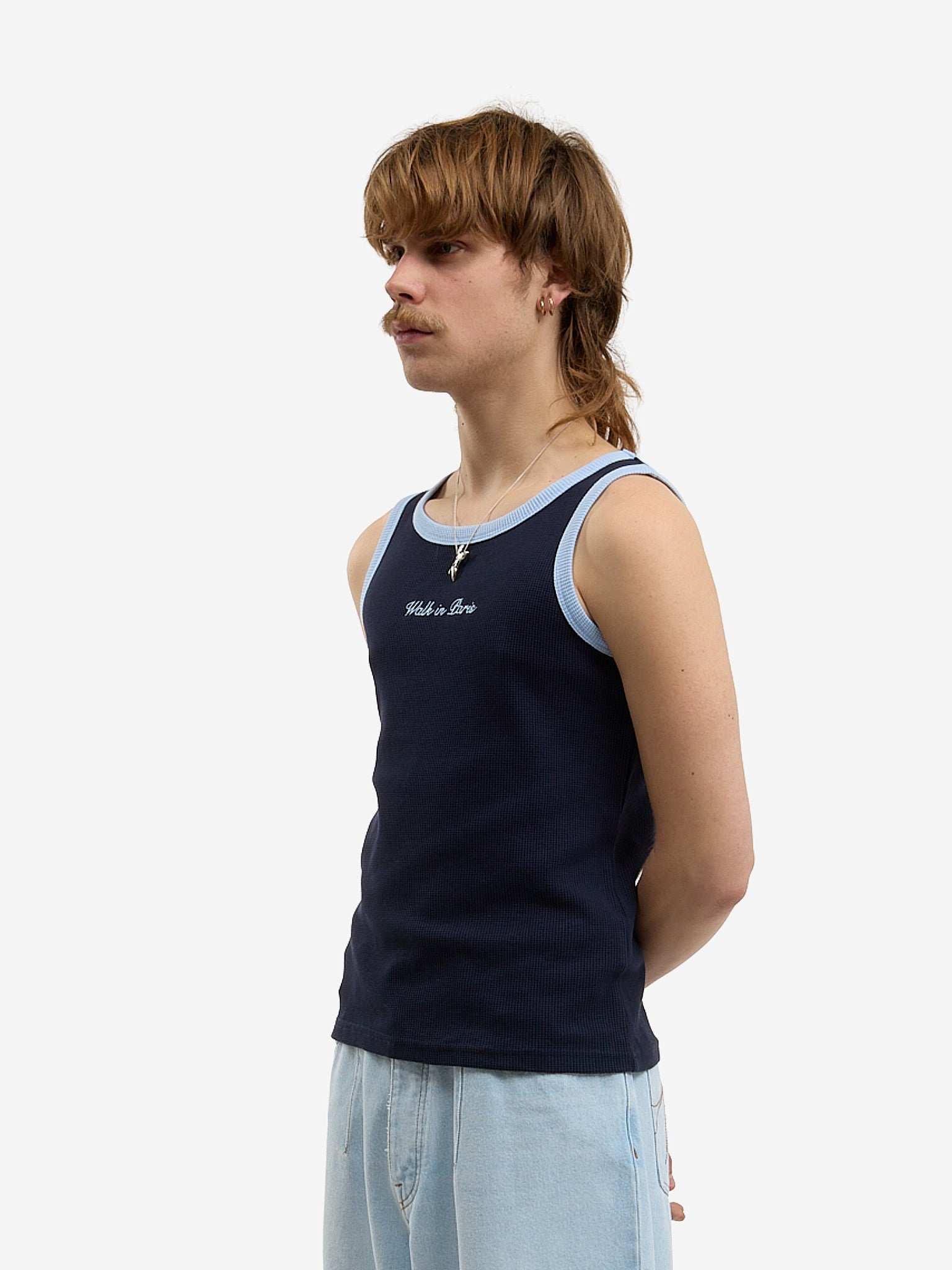 The blue waffle-patterned tank top 3