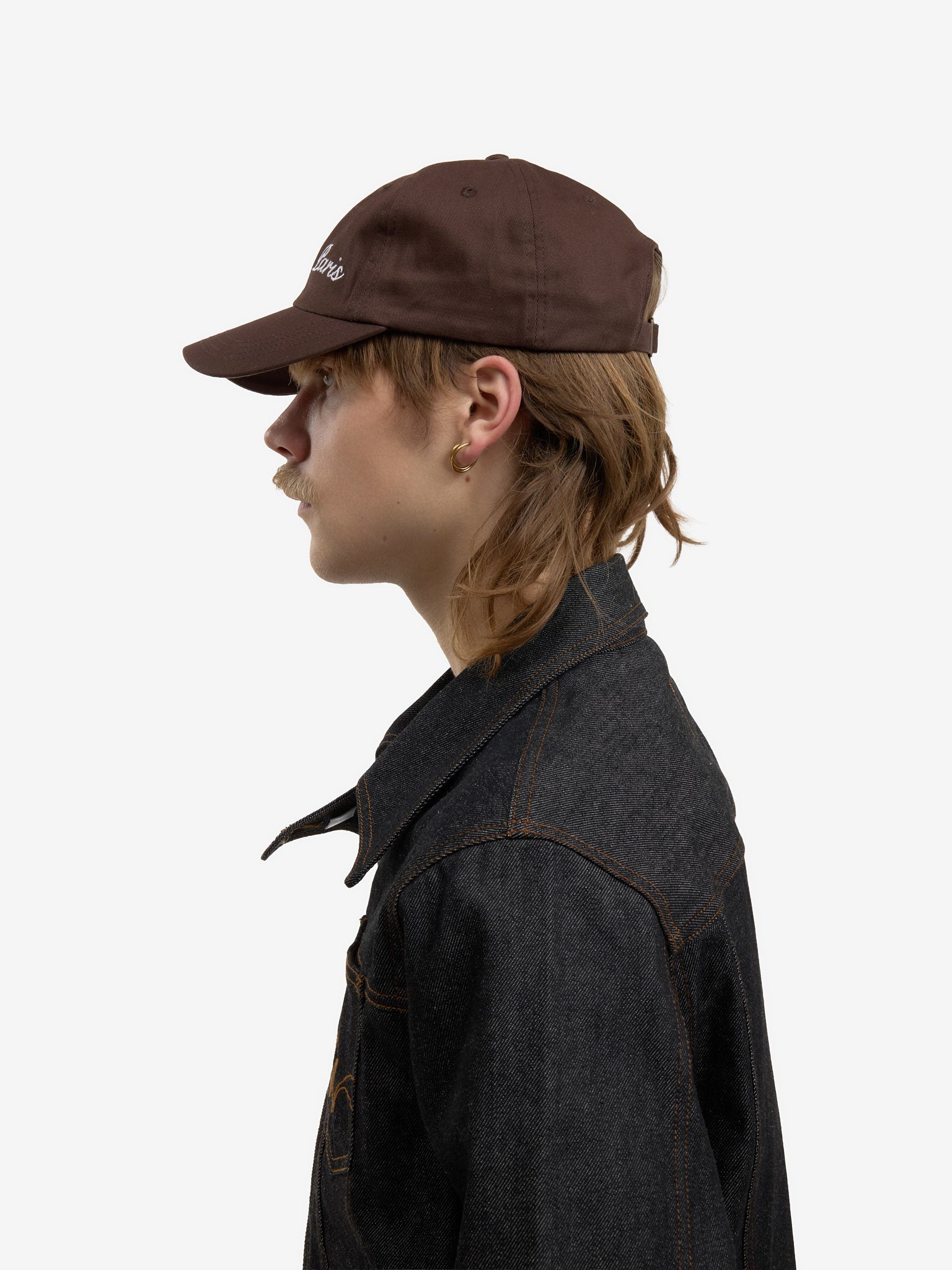 The brown baseball cap 7