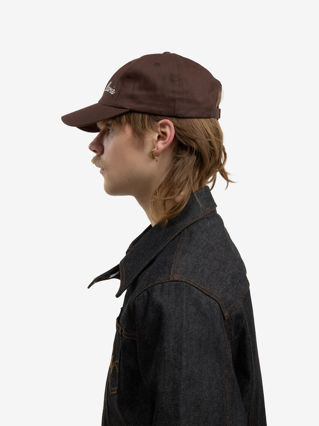 The brown baseball cap