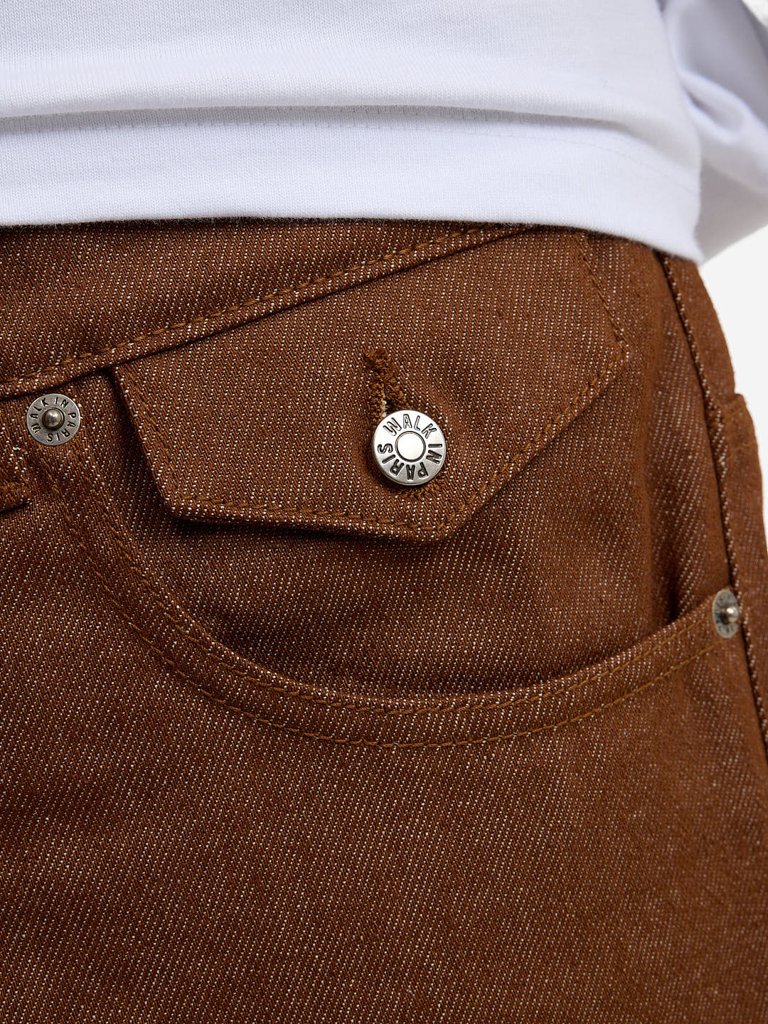 The brown baggy denim shorts