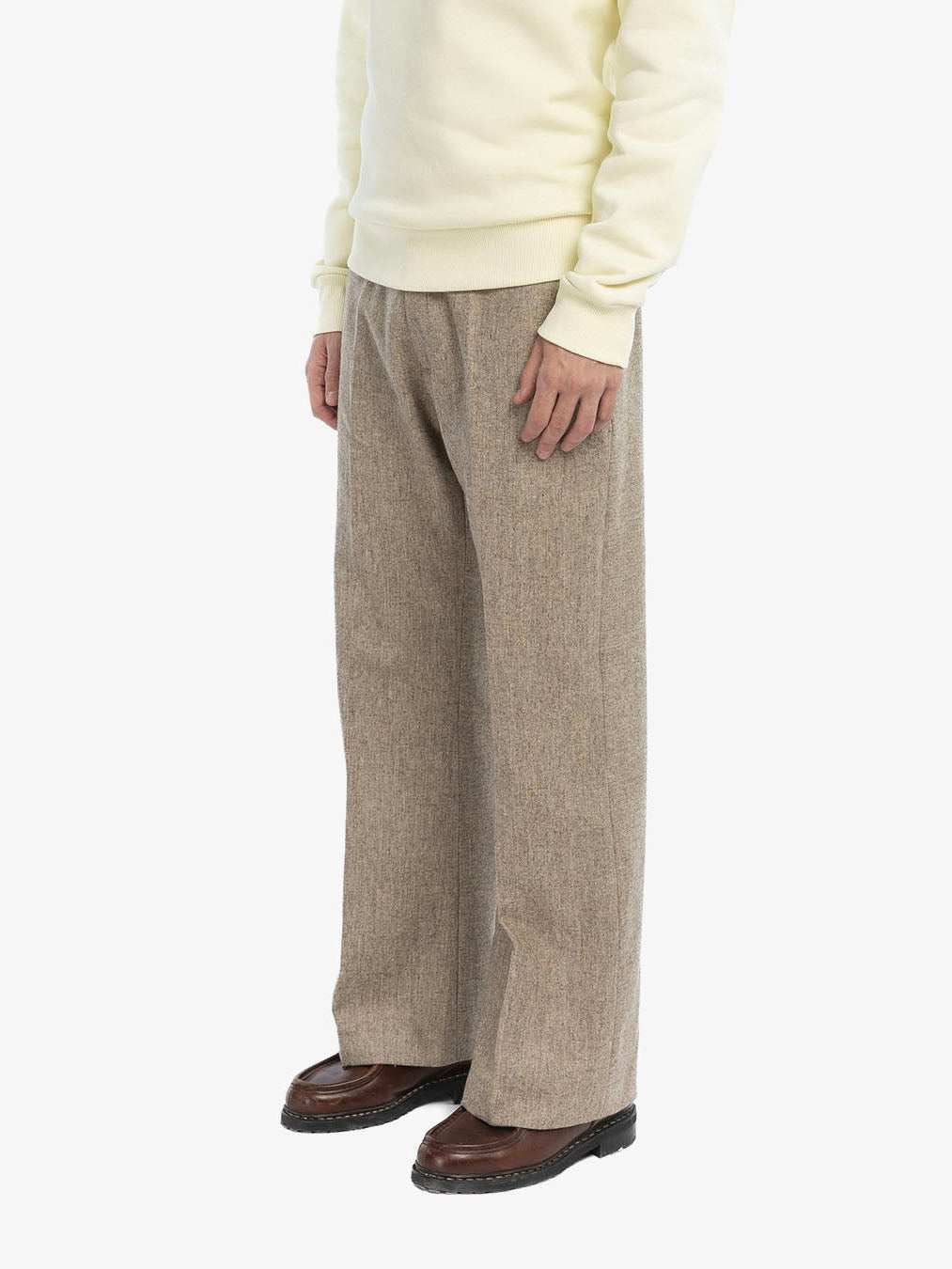 The beige flared suit pants