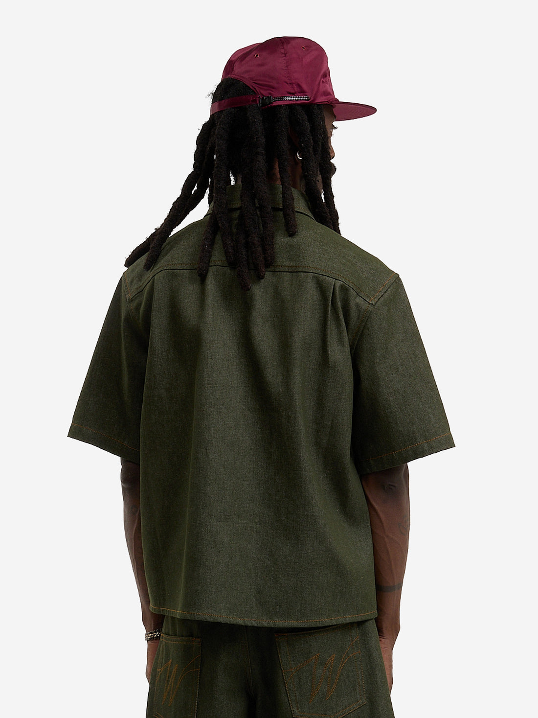 The raw green denim shirt