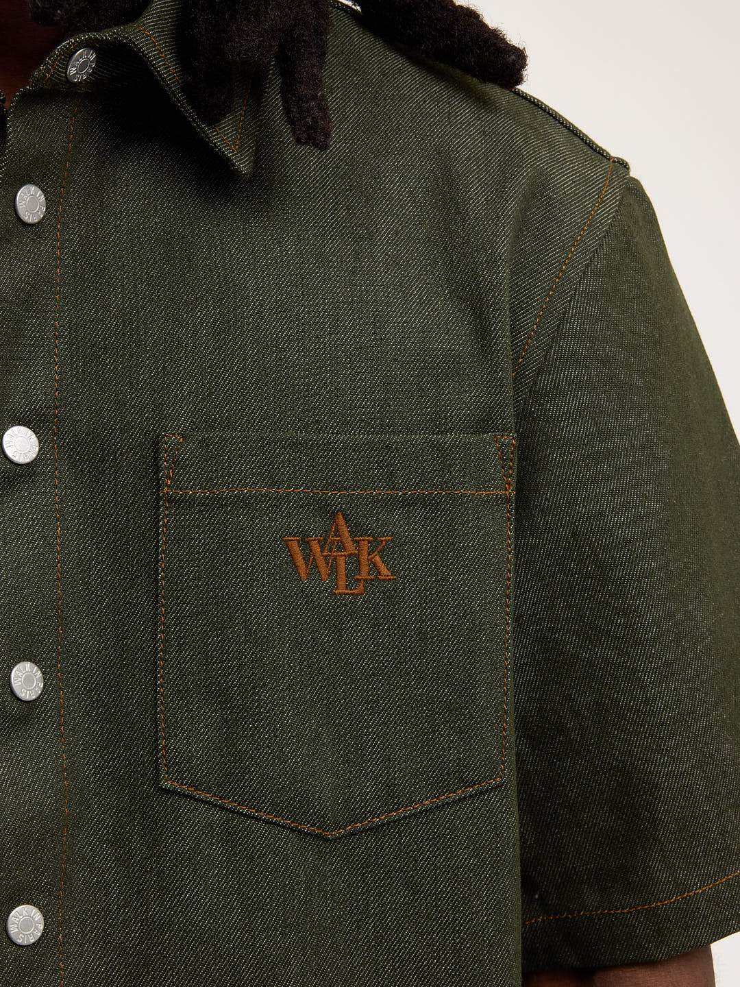 The raw green denim shirt