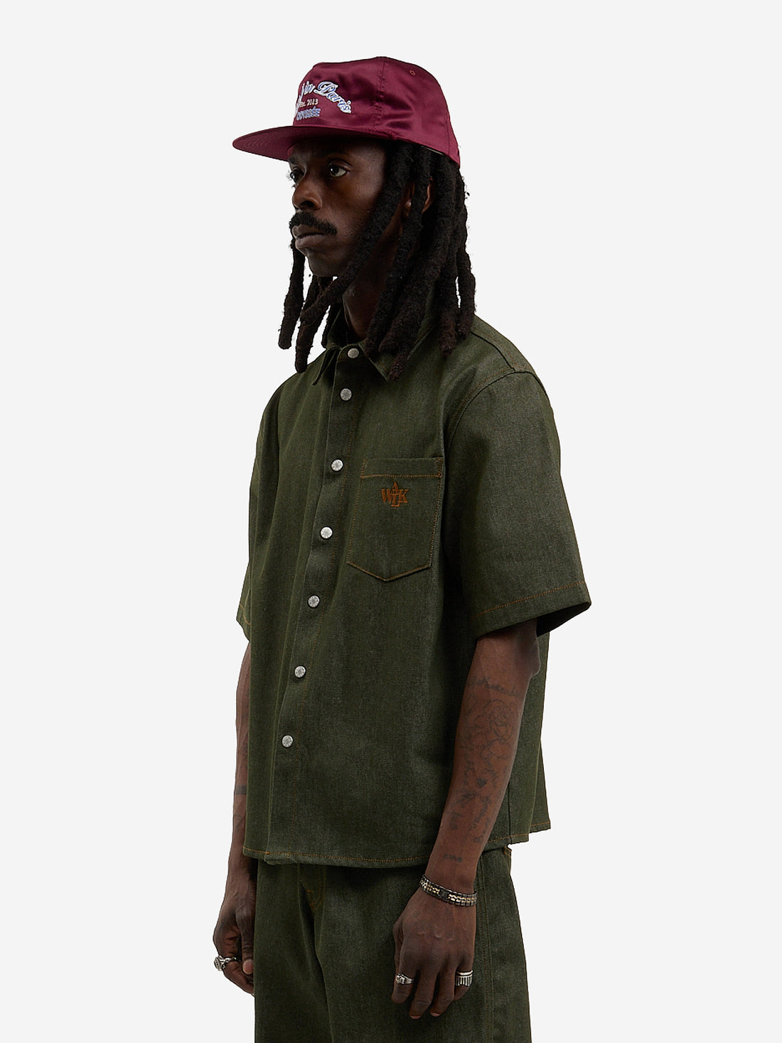 The raw green denim shirt