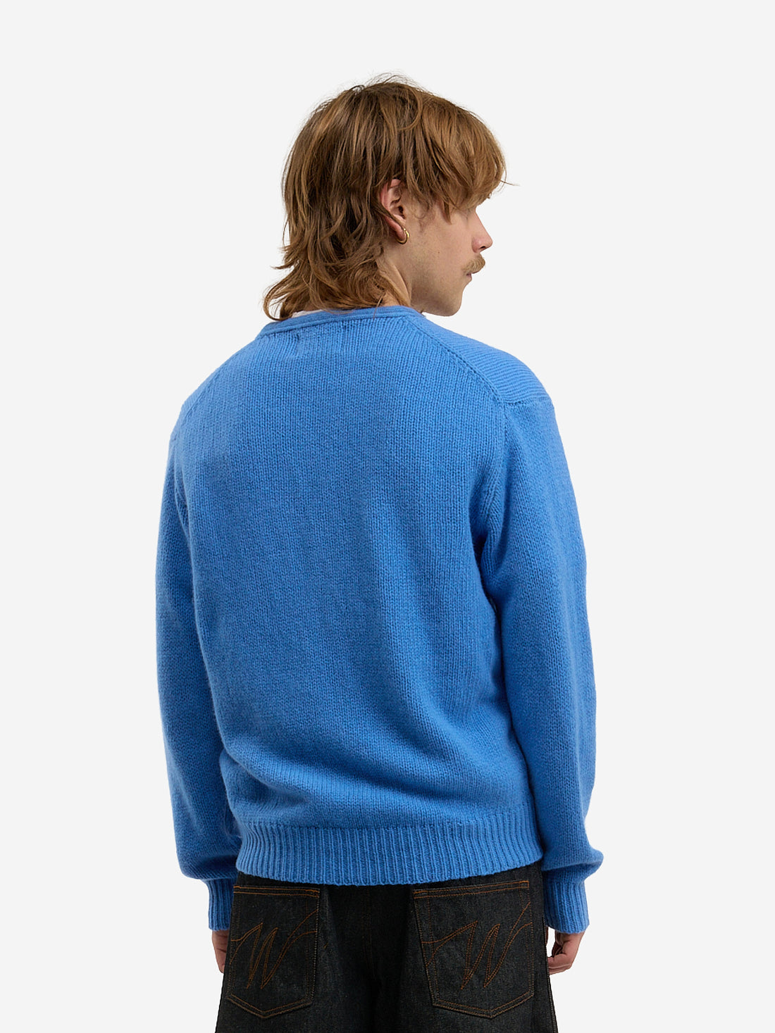The light blue cardigan