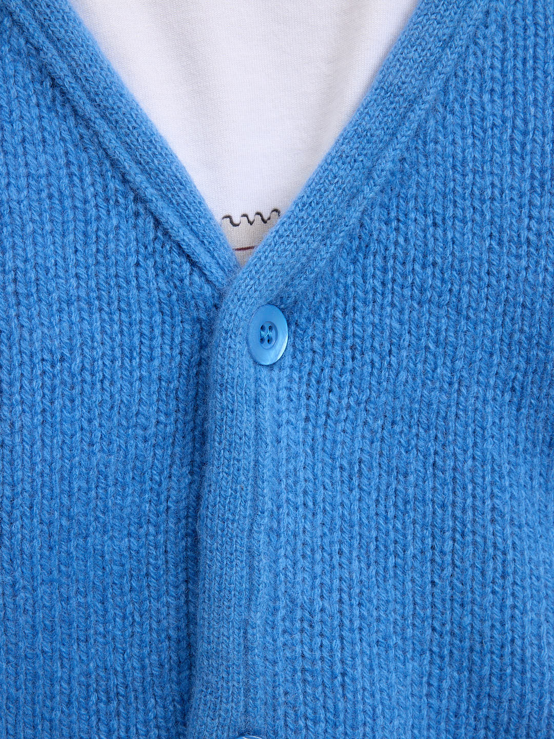 The light blue cardigan