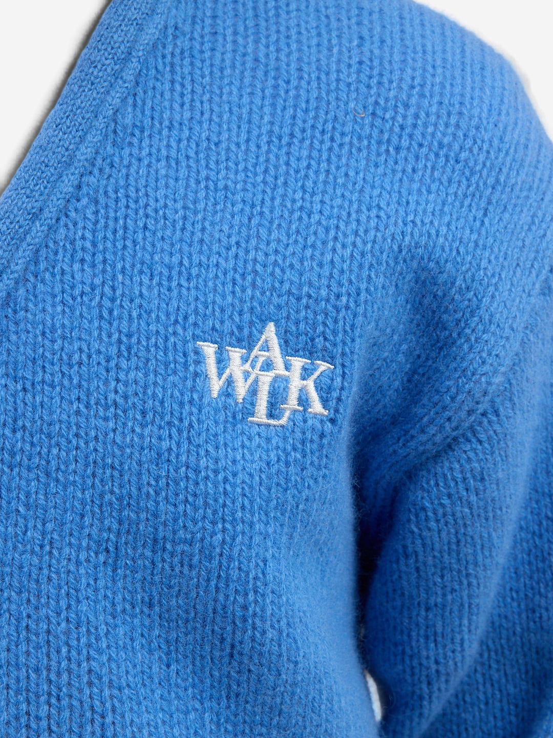 The light blue cardigan