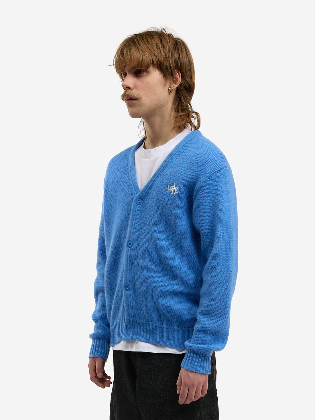 The light blue cardigan