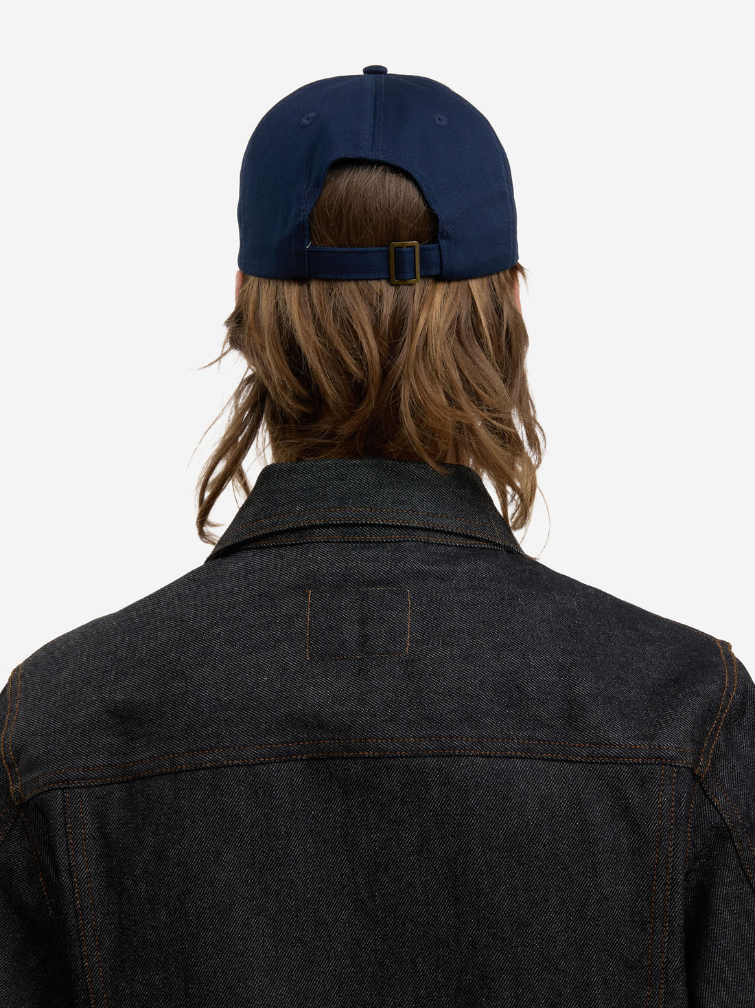 The navy blue baseball cap