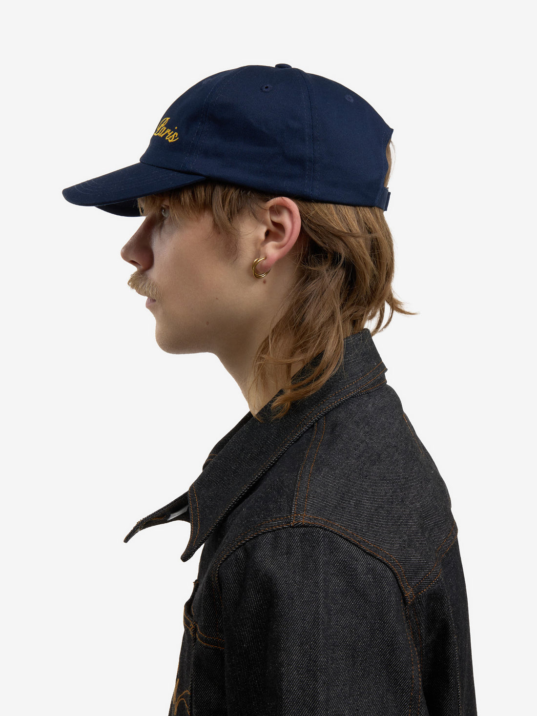 The navy blue baseball cap