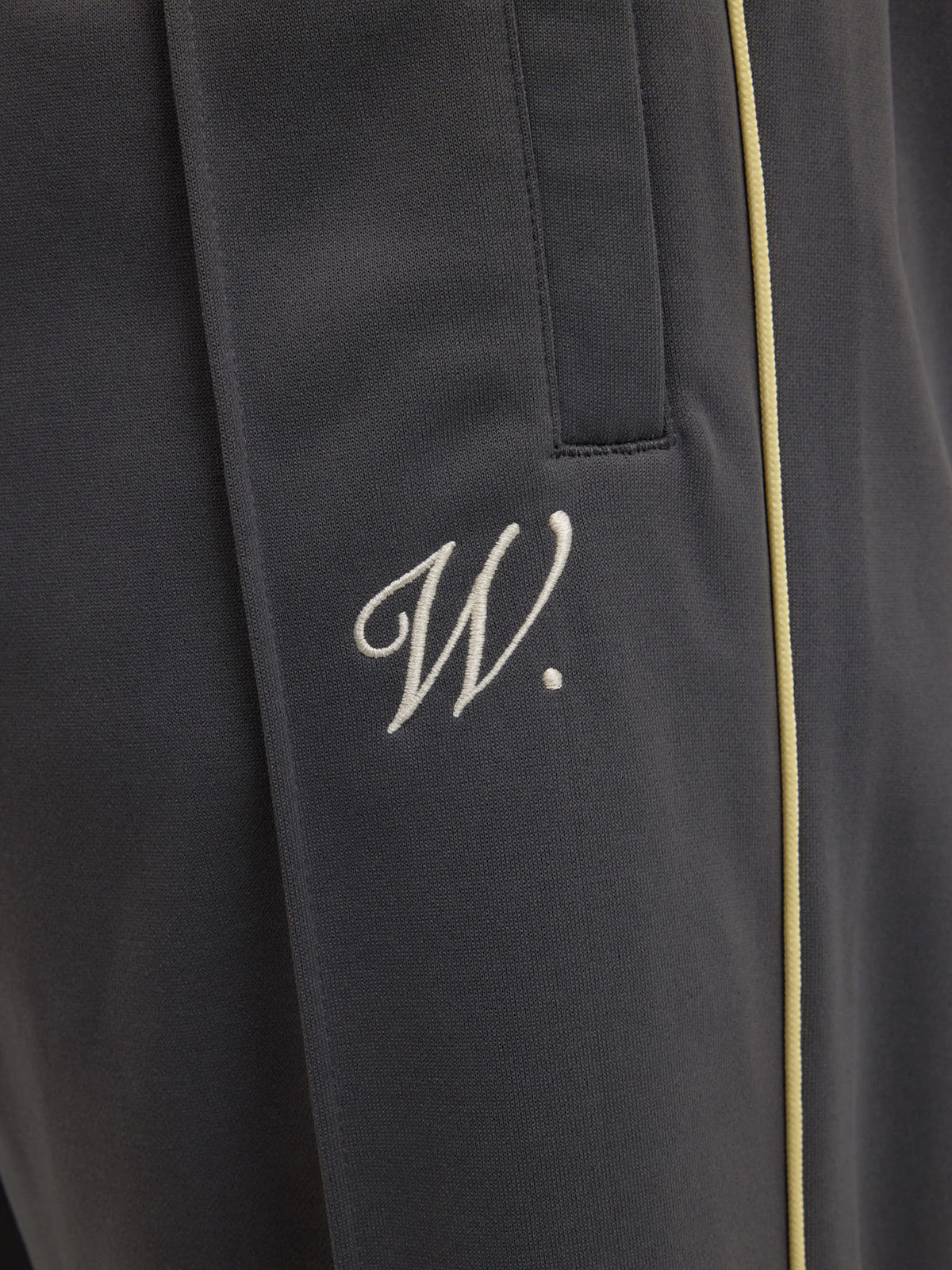 The grey and beige Signature jogging pants