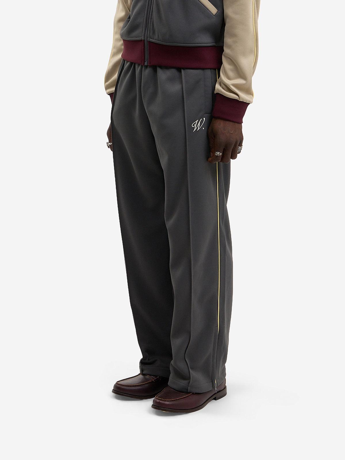 The grey and beige Signature jogging pants