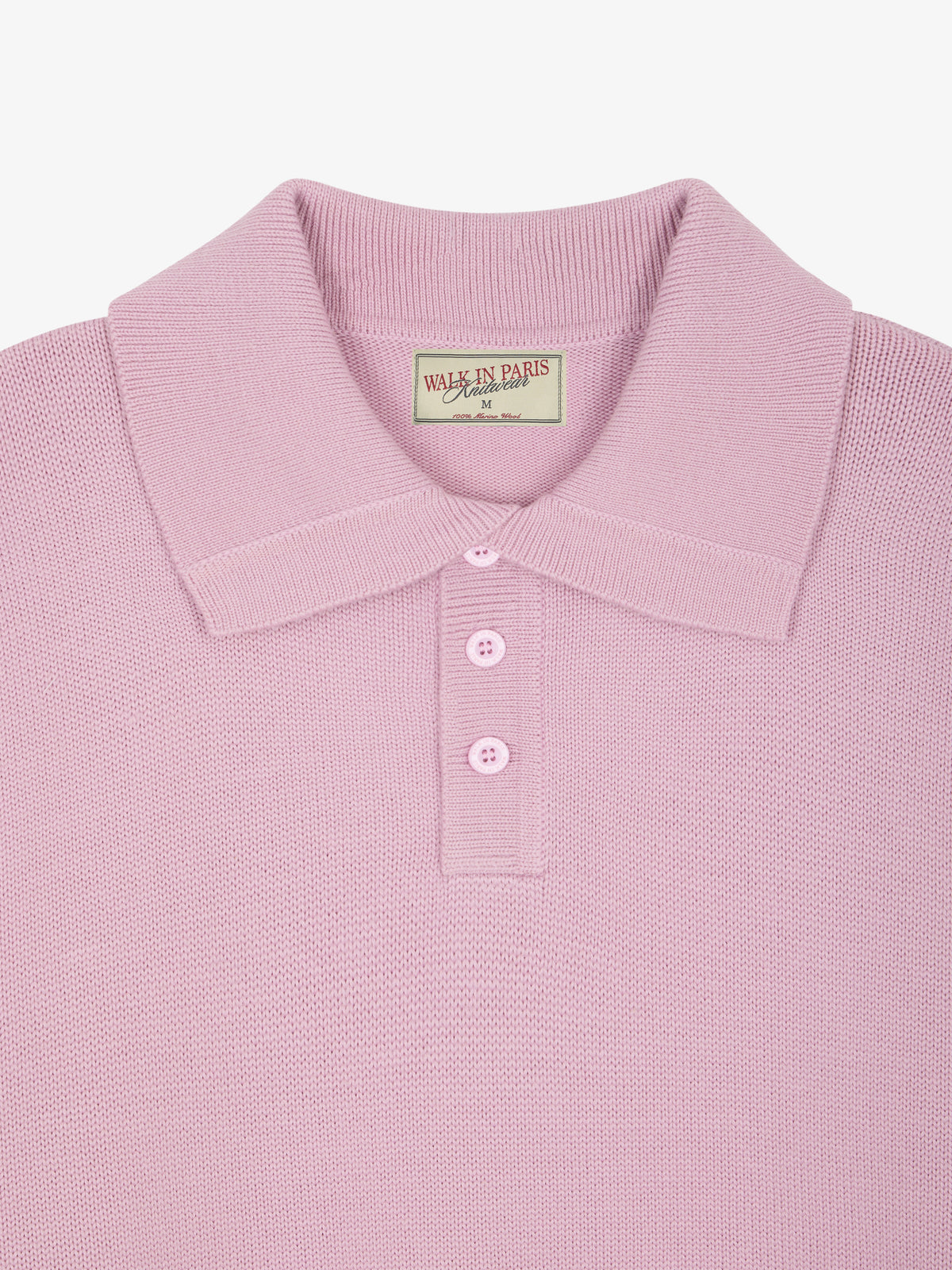 Le polo rose à col boutonné