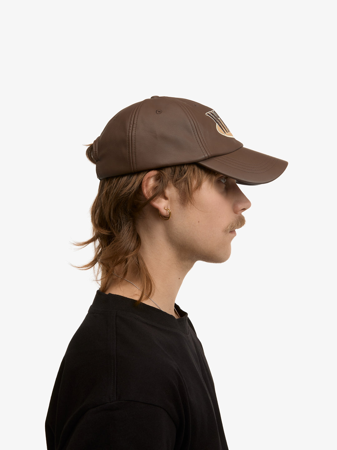 La casquette snapback marron