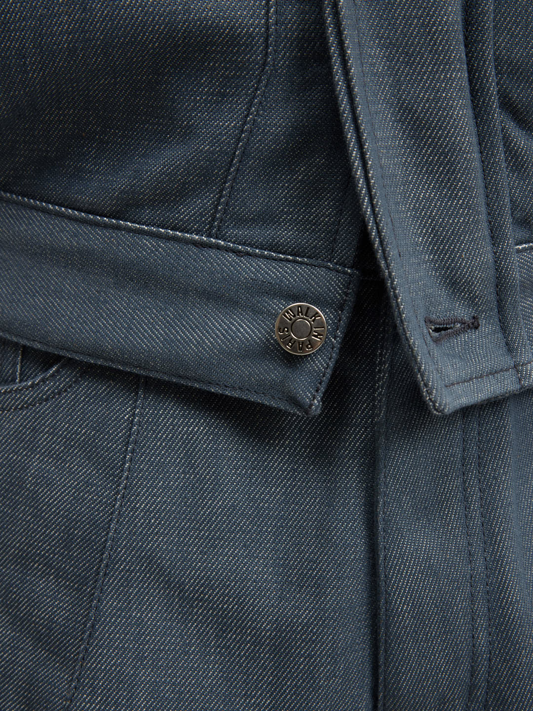 The postman's uniform jacket
