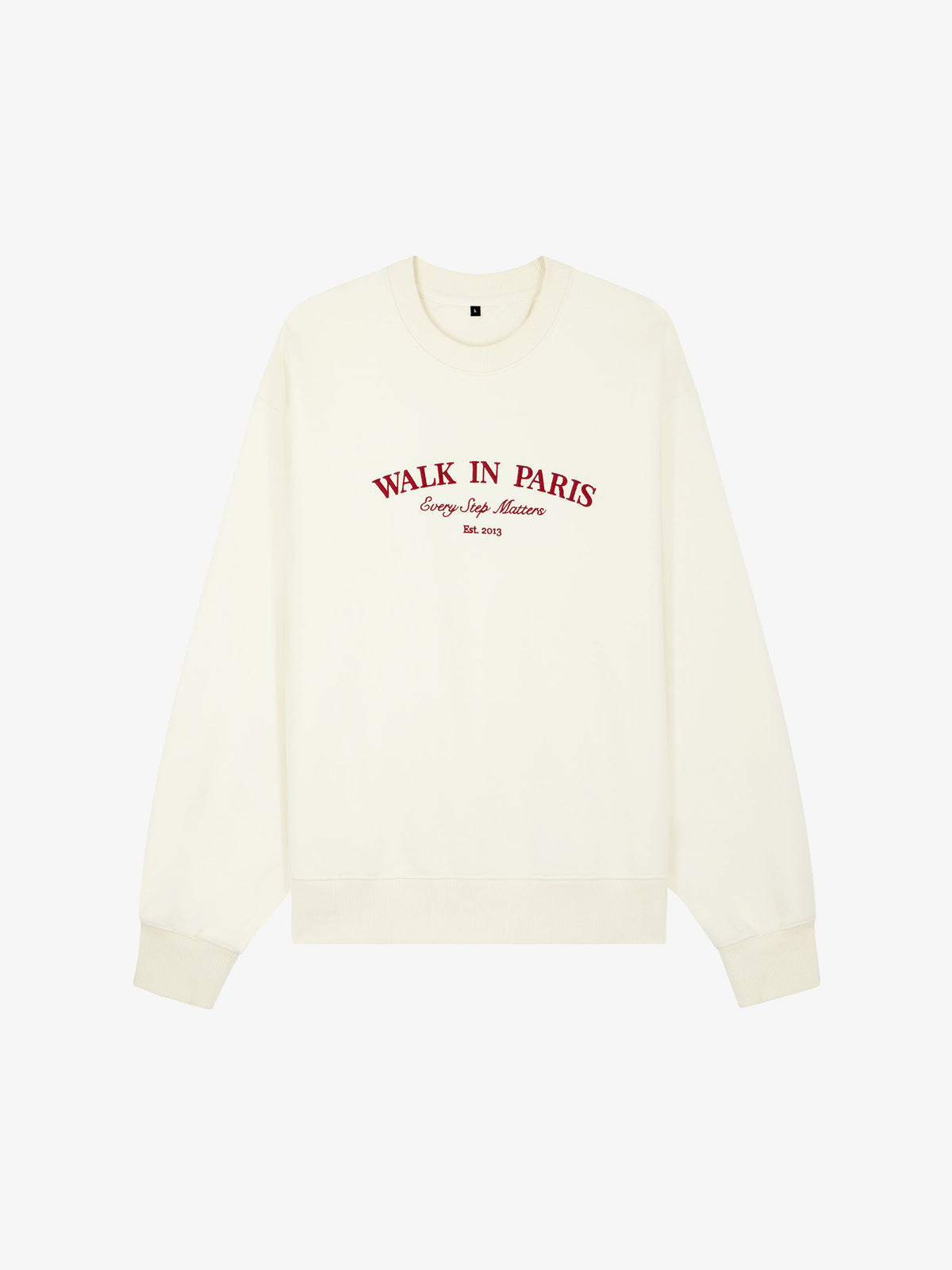 The beige sweatshirt