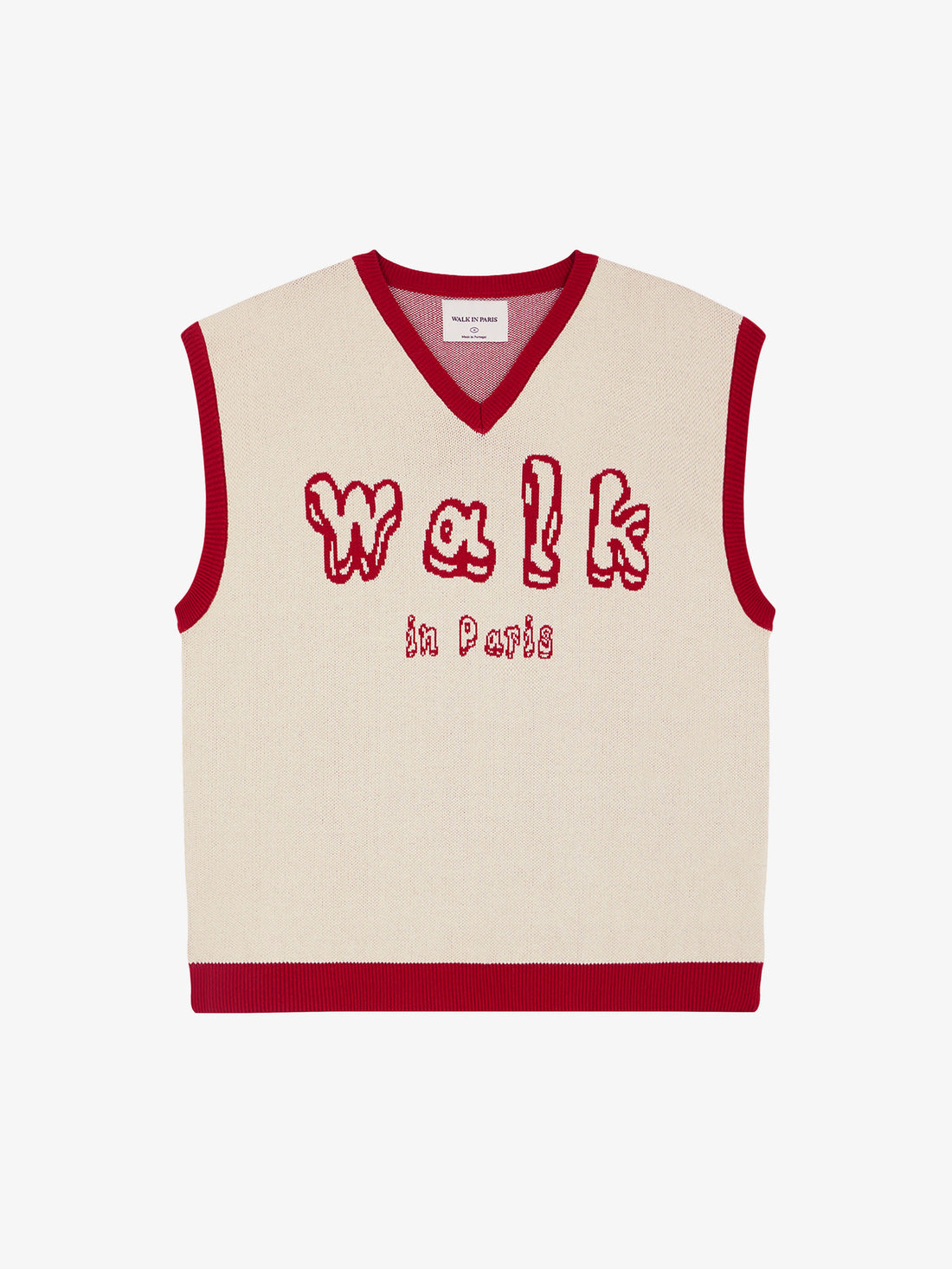 Le pull sans manches en maille rouge